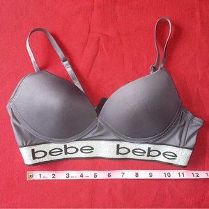 Bebe preowned dark grey bra w/silver elastic band, size 34B